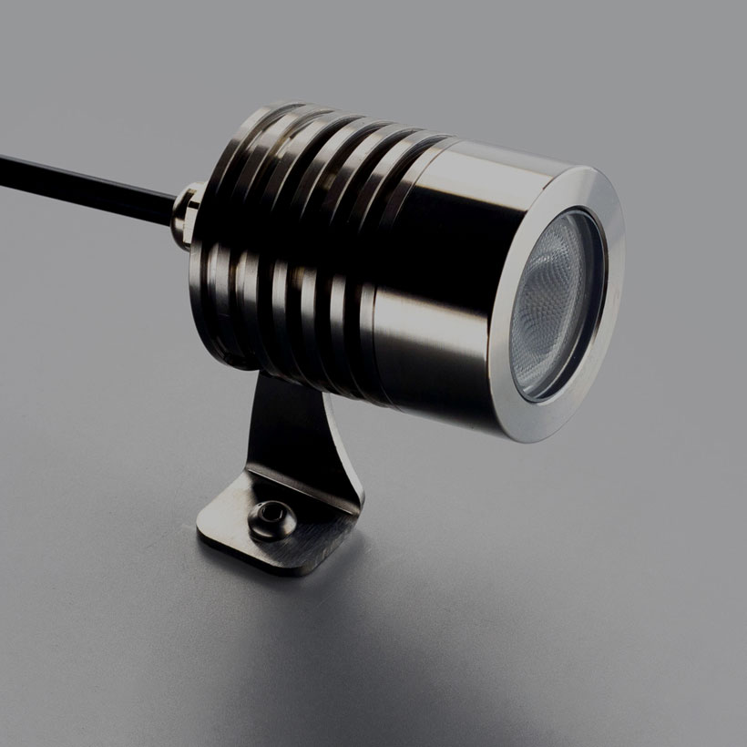 Shop Outdoor Lighting - stainless steel spot light surface mounted on grey background 