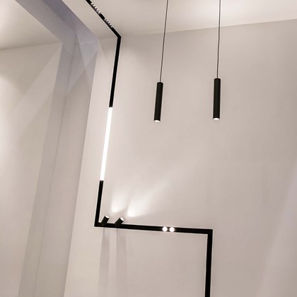DLD Shadowline architectural plaster-in modular track system in black, recessed into the ceiling with modular downlights fitted alternative image