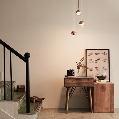 Seed Design Dora P1 LED Pendant lights this hallway with a warm light