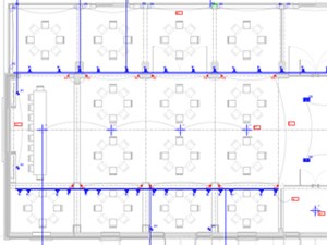 Close up of an AutoCAD Darklight Design lighting plan, laying out the position and identity of the light fittings over existing architecture and furniture layouts