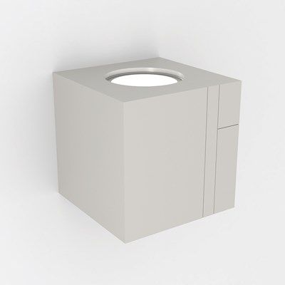 Nama Mondi Up Cube Wall Light switched on, set on a grey background