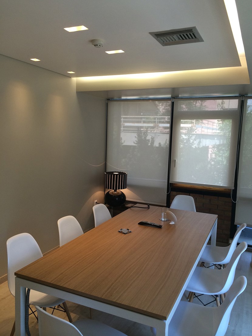 Nama Modular Fos 8 Plaster In Downlight Light installed in a contemporary office meeting room