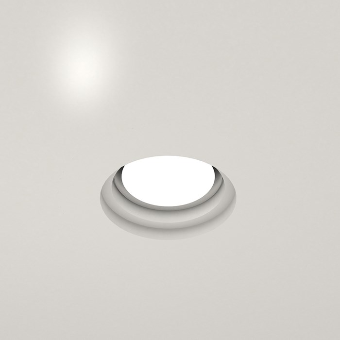 Nama Fos 02 Round Plaster In Downlight installed in a grey ceiling & switched on