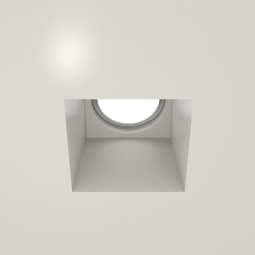 Nama Fos 08 Square Plaster In Downlight installed in a grey ceiling & switched on