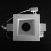 Component frame, lamp holder and fixings of the Nama Fos 08 Square Plaster In Downlight on black background