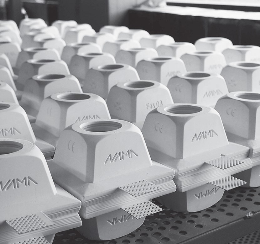 Nama Modular Fos plaster in square frames stacked up on a table in black and white