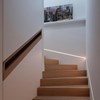 Eleni EL119 plaster in linear profile coving installed in a modern minimal stairway