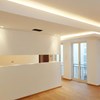 Eleni EL200 plaster in linear profile cornice LED lighting installed in a modern open plan living room
