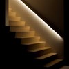 Eleni EL301 linear profile cornice installed as a hand rail, lighting a set of stairs