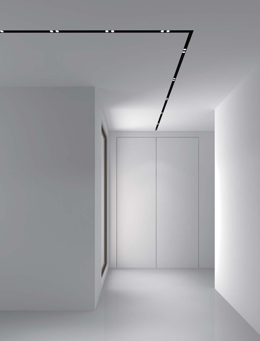 DLD Shadowline recessed track with right angle joint and twin LED spot lights in a contemporary modern hallway