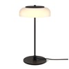The Nuura Blossi Table Lamp in black, turned on.