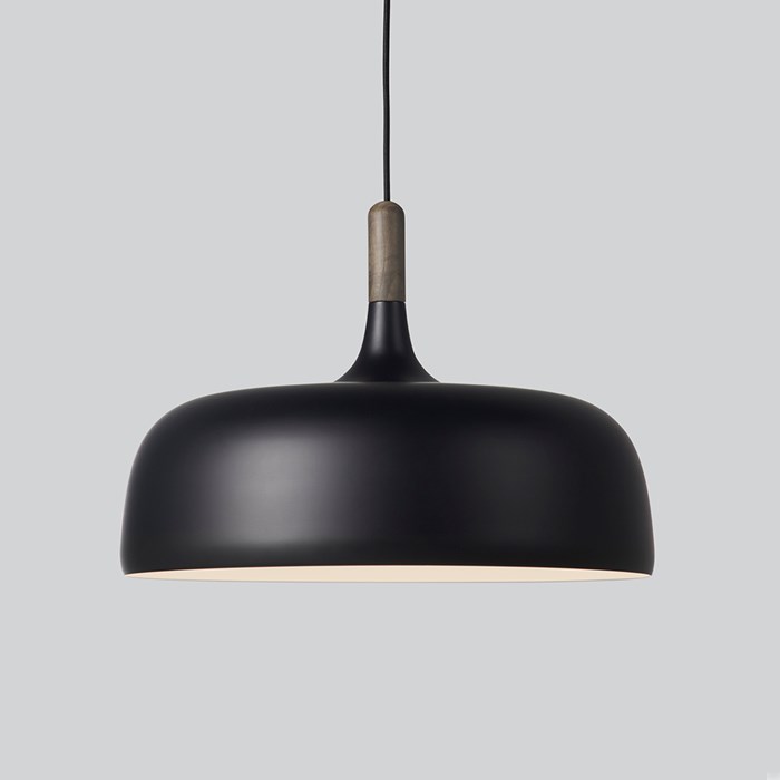 Product image of the Northern Acorn Pendant in black with a dark walnut stem, over a grey background.