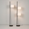 Freestanding floor lamp by Milan iluminacion in a walnut stained wood with warm led lights