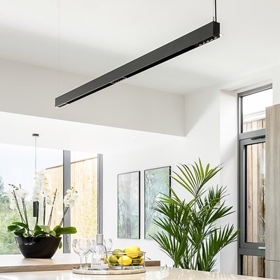 DLD Shadowline architectural modular track system in black, suspended over a kitchen worktop with modular downlights fitted