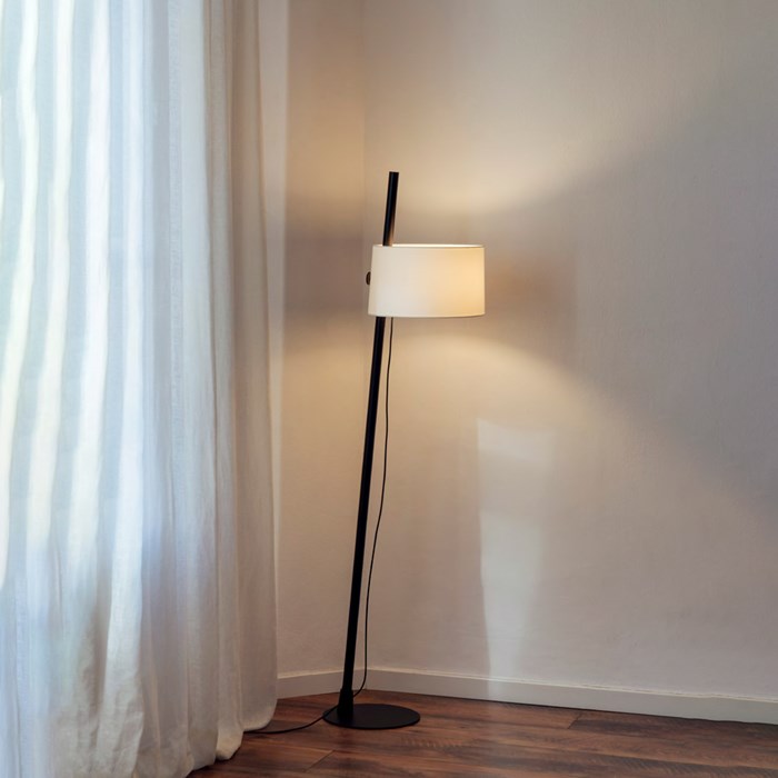Milan Iluminacion Linood Floor Lamp with slanted base in black lacquered steel in a contemporary space
