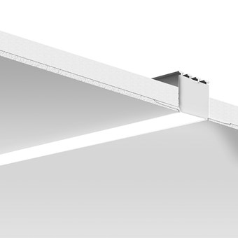 The DLD L12 profile in raw aluminium, installed in a ceiling with diffuser and end caps.