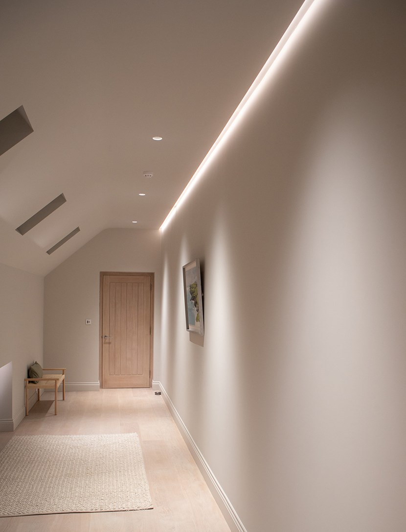 Lighting Design Pickwick indoor upstairs landing with ambient plaster-in profile lighting