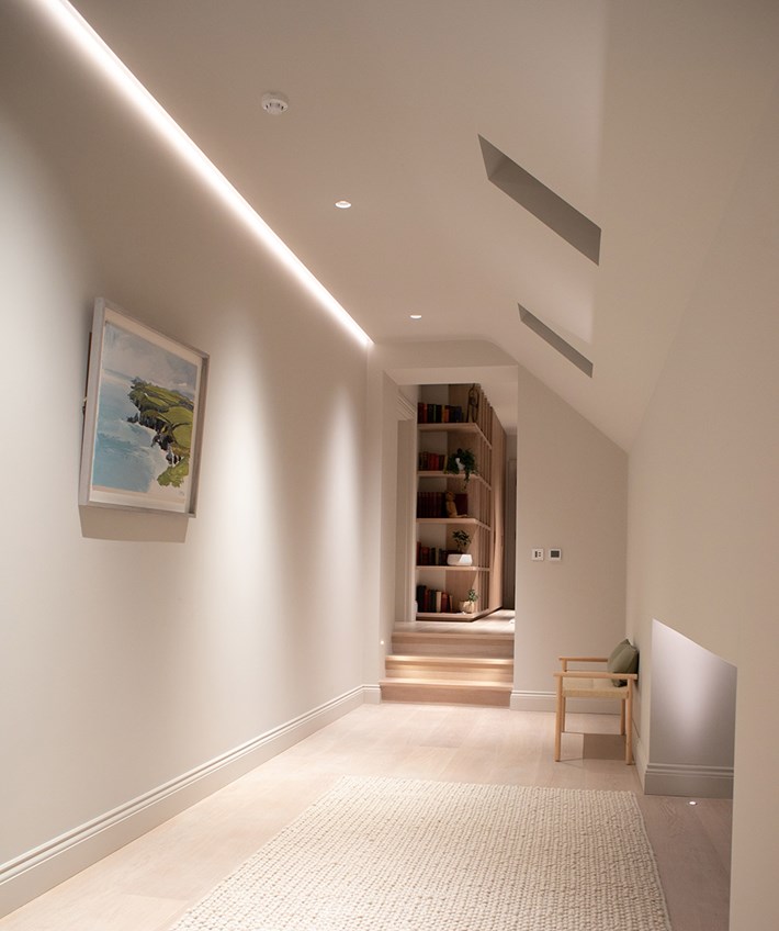 Lighting Design Pickwick indoor upstairs landing with ambient plaster-in profile lighting