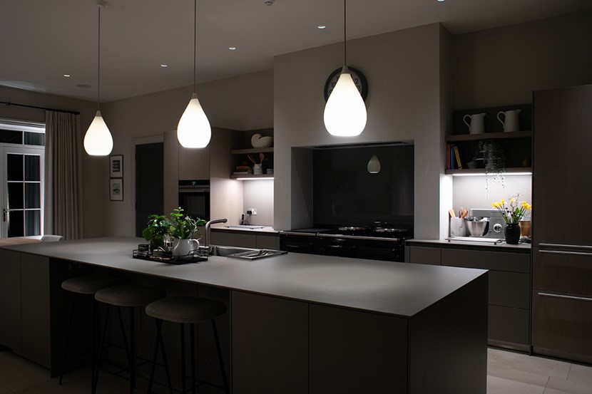 Lighting Design Pickwick indoor kitchen with linear LED task lighting & a row of 3 teardrop pendants over a kitchen island