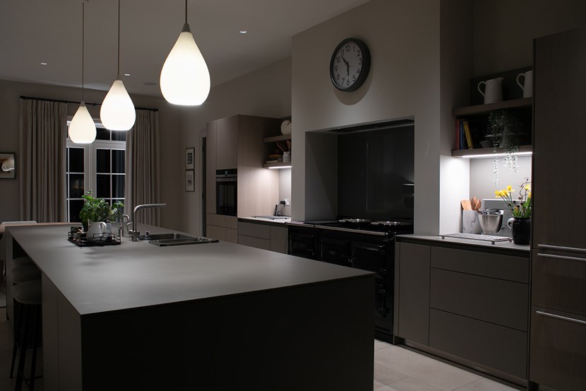 Lighting Design Pickwick indoor kitchen with linear LED task lighting & a row of 3 teardrop pendants over a kitchen island