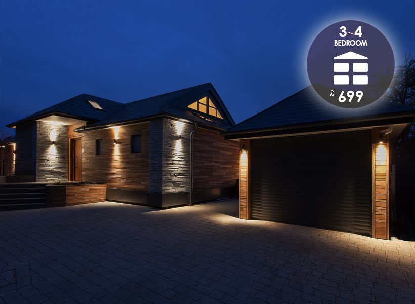 Lighting Design To Go: 3-4 bedroom package £699, showing a contemporary home & garage with wall wash up/down lights at night