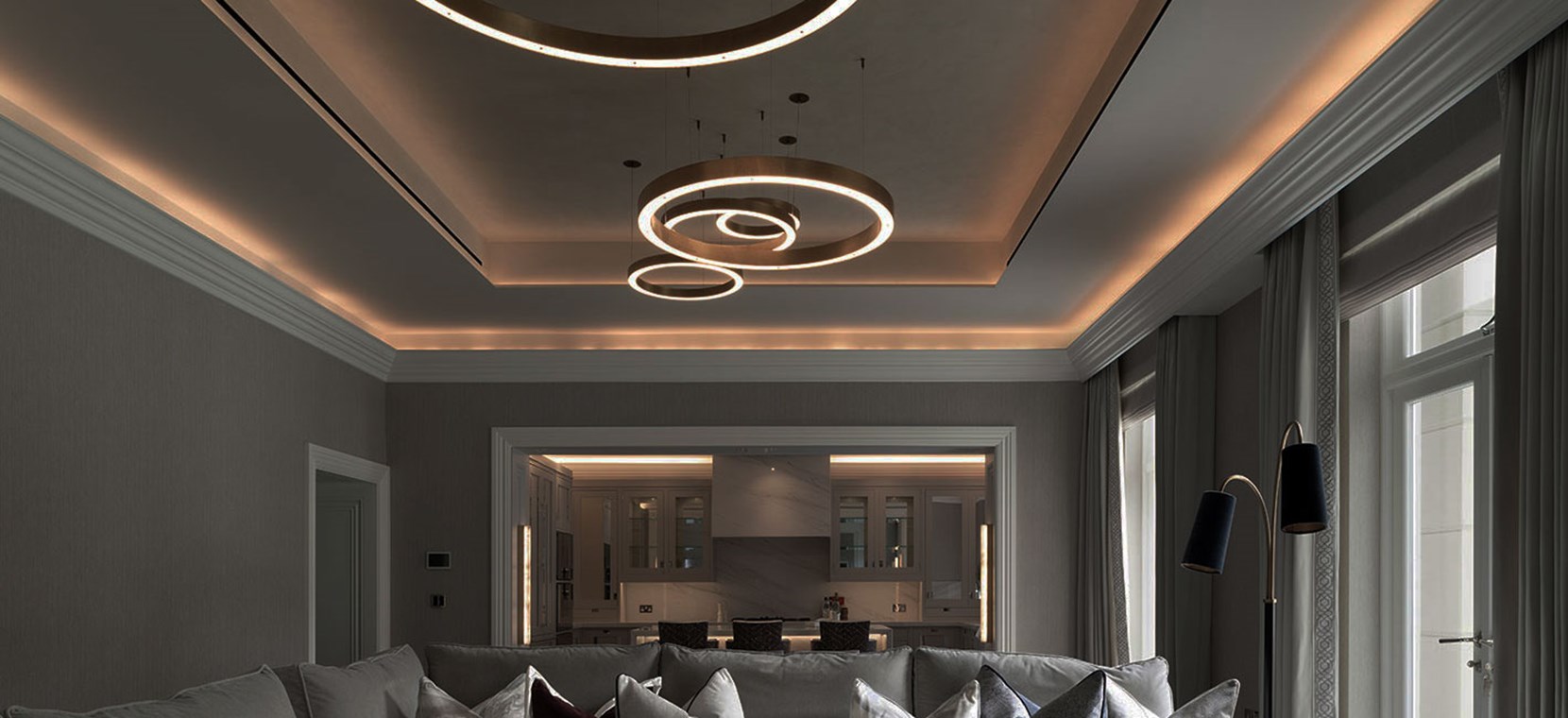 Lighting Design Lowndes Place bespoke circular chandeliers in contemporary living room