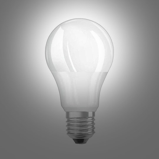Lamps & Accessories: LED light bulb with screw fitting on a dark background