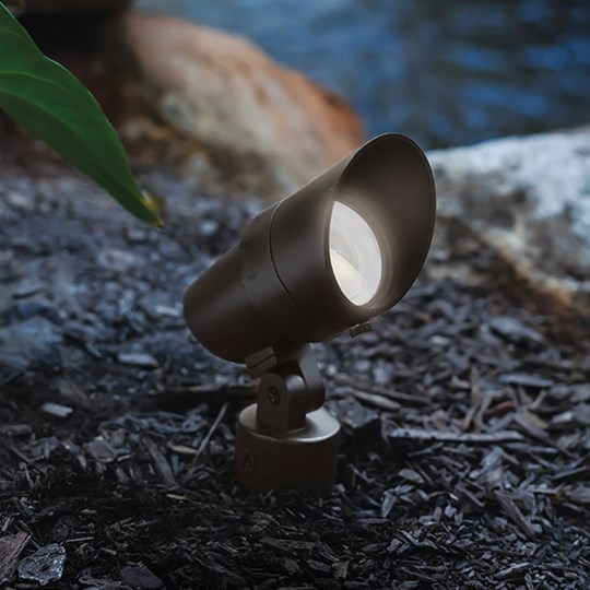 Outdoor LED adjustable spike spotlight at night, switched on