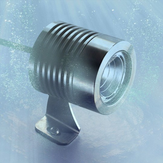 Outdoor LLD Point spot light in an underwater environment in a swimming pool or pond.