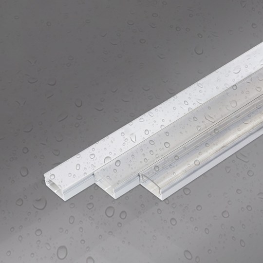 Outdoor aluminium linear profile for LED tape with opaque, frosted and clear diffuser, covered in water droplets