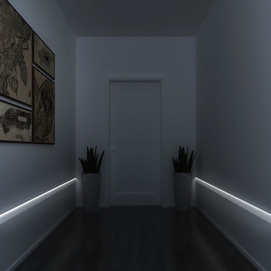Architectural plaster-in linear LED profile offering low level light in a modern hallway with wood floor