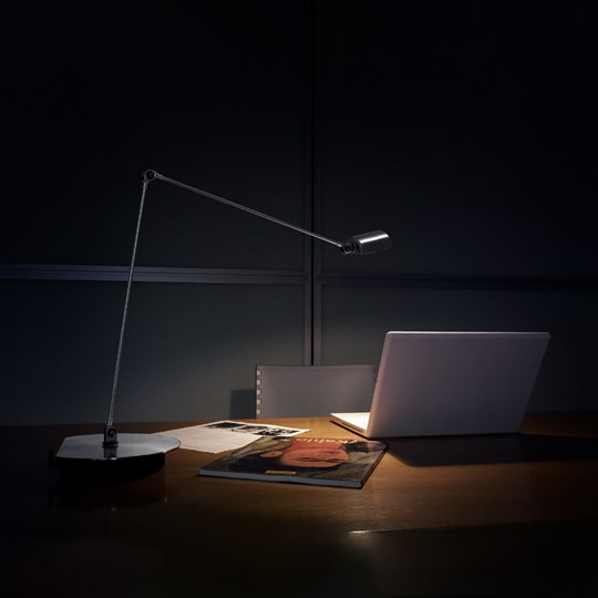 Indoor Lighting: Contemporary Lumina Daphine desk lamp lighting a laptop at a home office desk