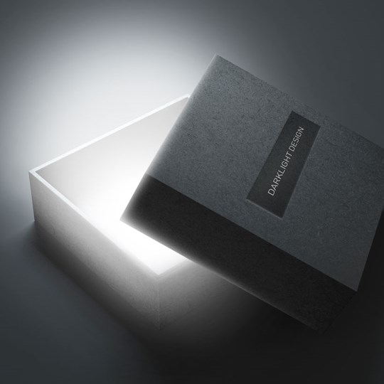 Lighting Design To Go: Darklight Design box slightly with open letting out a bright white light