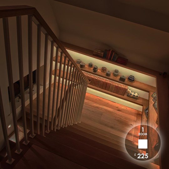 Lighting Design To Go: 1 Bedroom package £225, landing of a modern wooden staircase with shelf lighting