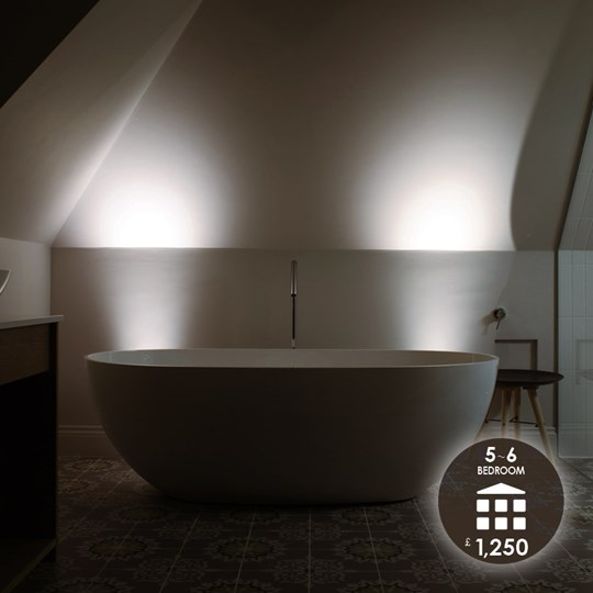 Lighting Design To Go: 5-6 Bedroom package £1,250, showing a modern bathroom with calming lighting & a free standing bath 