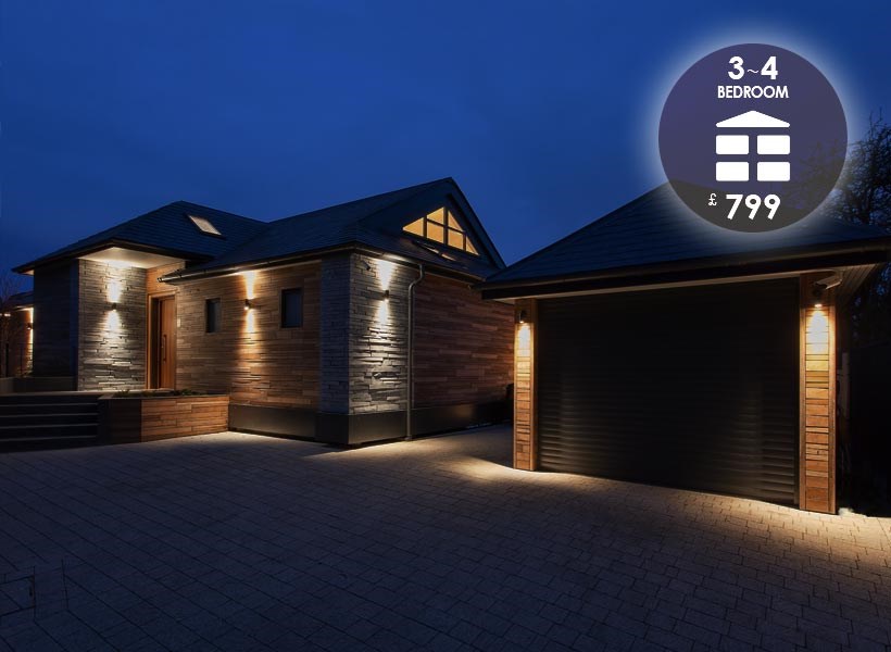 Lighting Design To Go: 3-4 bedroom package £799, showing a contemporary home & garage with wall wash up/down lights at night