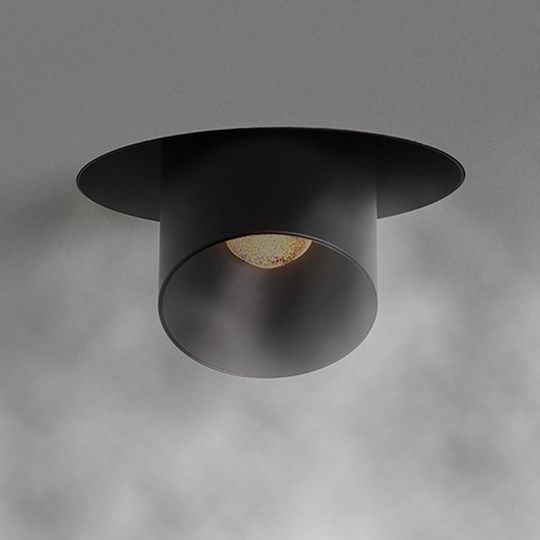 Ventilation Lighting: a plaster-in trimless downlight with built in air ventilation clearing the steam from a room