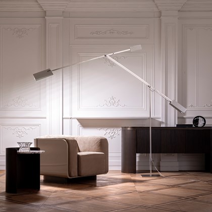 Esperia Giraffa Floor Lamp in centre of lounge over armchair