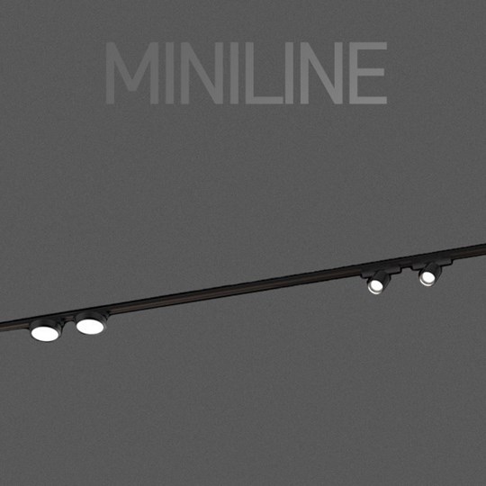 Miniline track with 4 spotlights on dark background, with overlaid typography